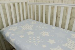 Простынь на резинке для детской кроватки Руно 60х120, голубая/звезды, бязь